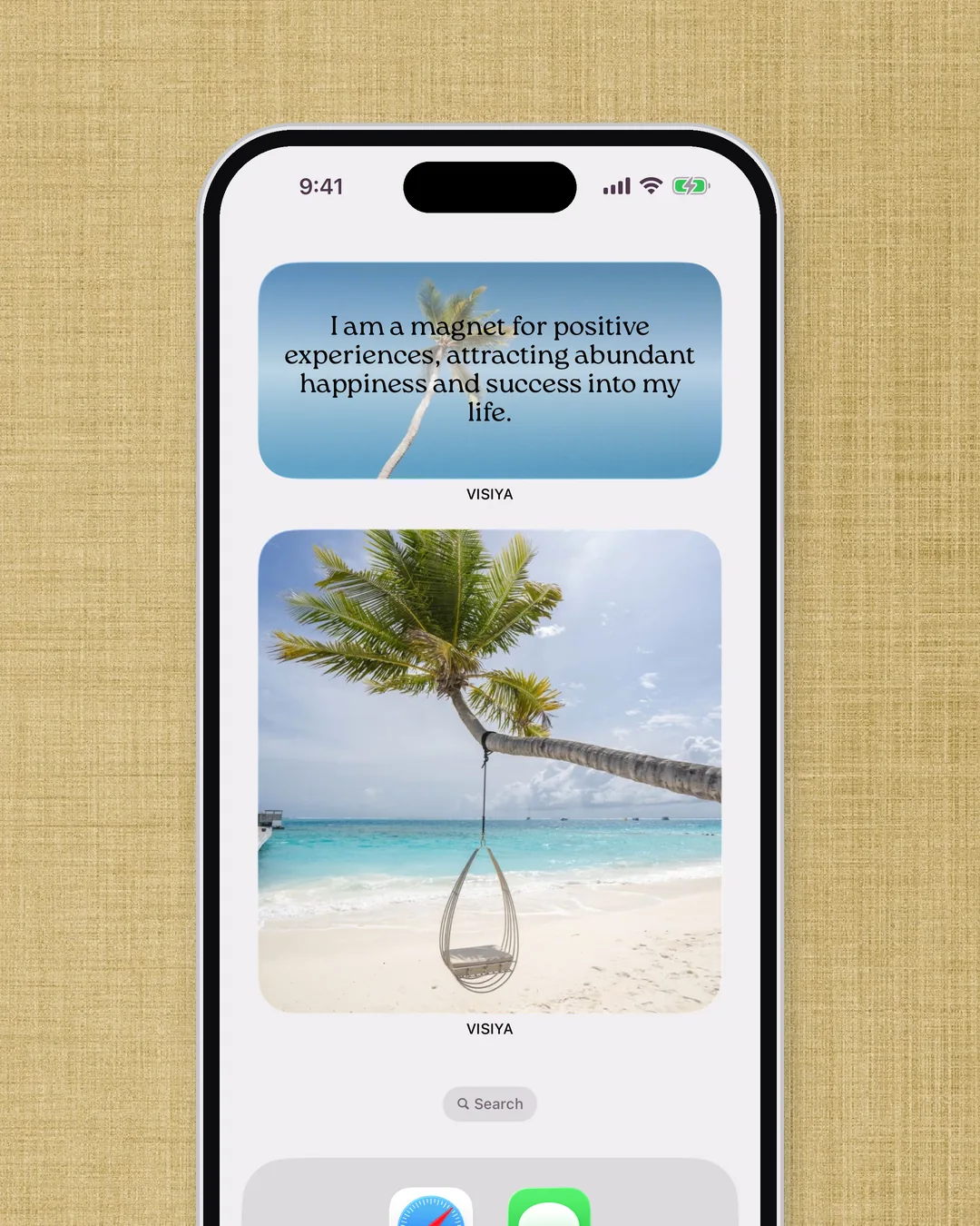The VISIYA widget (VISIYA Plus) on an iPhone home screen, showing pictures from a vision board