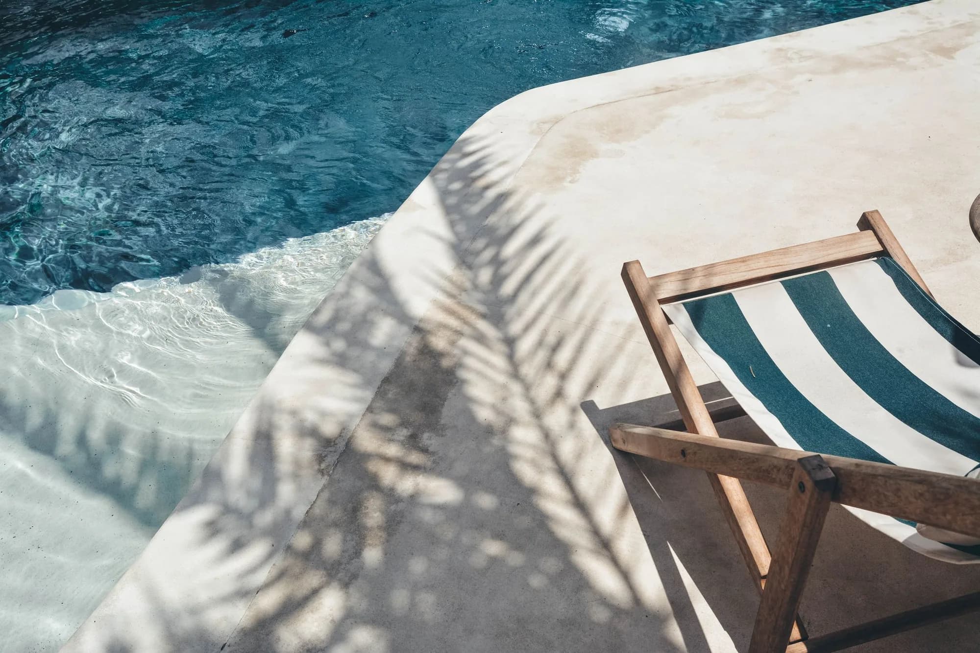 Relaxing on deck chairs by the sea