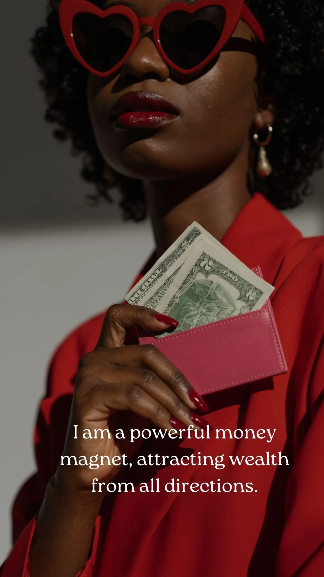 Money affirmation card: a woman in red tucking dollar bills into a pink wallet, captioned "I am a powerful money magnet, attracting wealth from all directions."