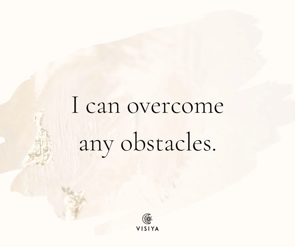 A VISIYA affirmation card reading "I can overcome any obstacles."